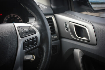Fototapeta na wymiar Steering wheel right side. The past of steering wheel. Automotive Interior, Steering Wheel Close up.