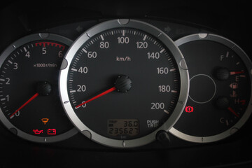 Fototapeta premium car​ instrument panel, car​ speen motor of​ night, car​ dashboard​ modern​ automobile control​illuminated panel​ speed display.