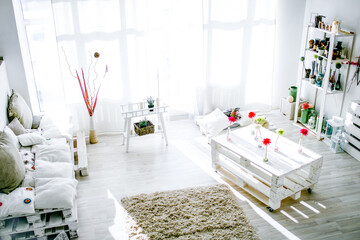 modern white living room interior in sunny morning.