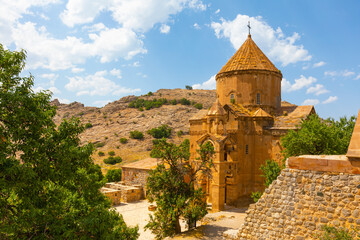 Fototapeta na wymiar The Cathedral of the Holy Cross on Akdamar Island, in Lake Van in eastern Turkey, is a medieval Armenian Apostolic cathedral, built as a palatine church for the kings of Vaspurakan.