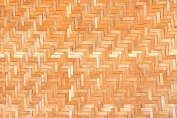 Bamboo brown straw mat, abstract background texture.