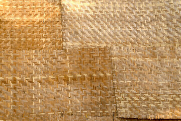 Woven palm wood pattern. Bamboo brown straw mat.