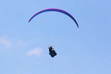 Paraglider being towed on a winch launch	