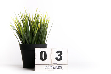 date october on a wooden background