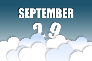 september 29th. Day 29 of month,Month name and date floating in the air on beautiful blue sky background with fluffy clouds. autumn month, day of the year concept