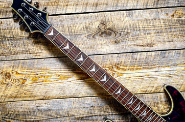 Electric guitar on wooden background vintage look