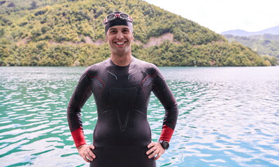 triathlete swimmer portrait wearing wetsuit on training