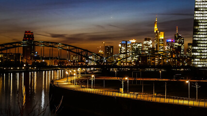 Night skyline of Frankfurt above the Main river in Germany