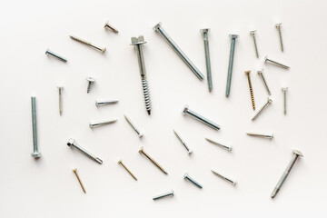 bolts with nuts on a white background, bolts and nuts