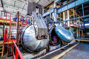 industrial equipment at the factory in large production hall