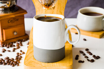 Pour over coffee maker, coffee cup and mug