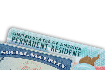 Green Card US Permanent resident card and Social Security card on white isolated background. 