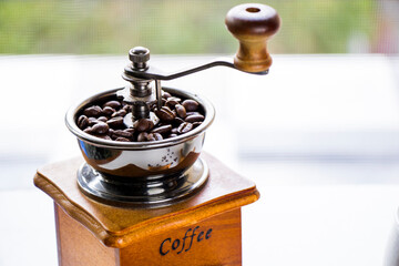 Coffee grinder, maker, cup and beans, morning coffee