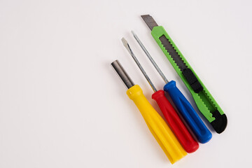 construction tools screwdrivers on a light background equipment for repair industry