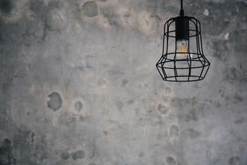 Industrial bulb lamps. Abstract cement background