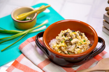 Egg fried rice with mushrooms, children's food on the table, set up appetizing.
