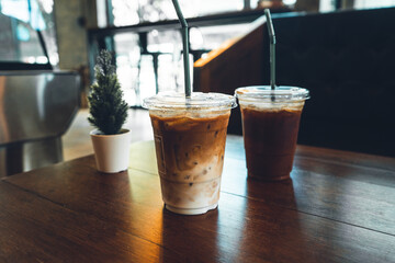Iced coffee put a glass on the table in a coffee shop.