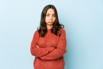 Fototapeta premium Young mixed race hispanic woman isolated unhappy looking in camera with sarcastic expression.