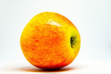 Red Gala apple close up on white background