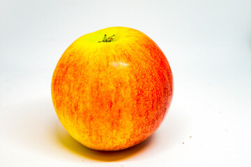 Red Gala apple close up on white background