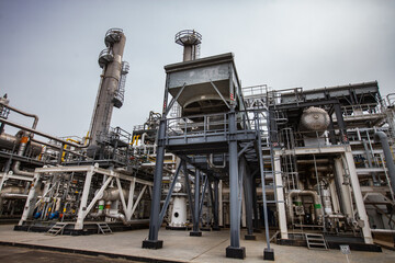 Oil refinery and gas processing plant. pipelines and distillation towers (refining columns)....