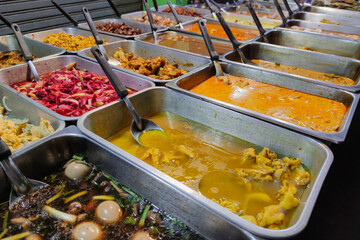 Images of many foods sold on the streets of Thailand