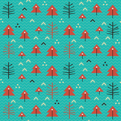 Simple Christmas pattern with trees on a blue background.