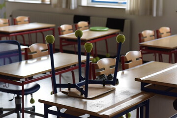 Empty children classroom with chairs and tables