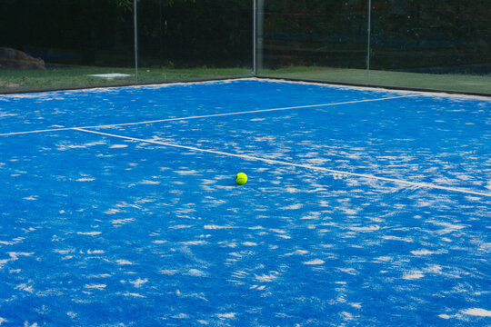Paddle tennis ball on a paddle tennis outdoor court for background