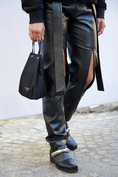 Woman with black leather trousers and Prada bag on September 26, 2020 in Milan, Italy