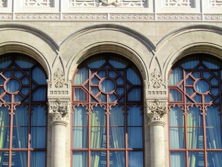 Old ornate theater building detail with windows in Budapest, Hungary