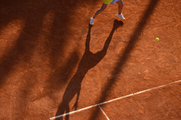 tennis player training on a court © Oquio