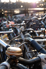 Fototapeta na wymiar Dutch bicycle parked in racks. Selective focus