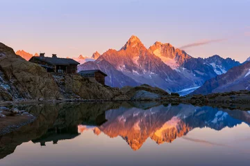 Paintings on glass Mont Blanc Colourful sunset on Lac Blanc lake in France Alps. Monte Bianco mountain range on background. Vallon de Berard Nature Preserve, Chamonix, Graian Alps. Landscape photography