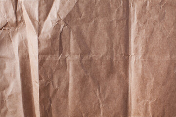 crumpled paper in the entire frame. Textured background. Copy space.