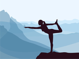 Naklejka na ściany i meble Silhouette of girl practising yoga. Blue mountains in background. Healthy lifestyle.