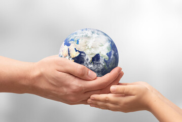 Earth globe in hands. World environment day. Elements of this image furnished by NASA
