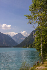 
sunny day on the turquoise Lake Plansee in the Austrian Alps