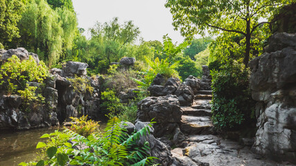 Path by water in Shenyuan (Shen Garden) scenic area in Shaoxing, China