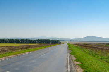 The road going into the distance towards the mountain ranges