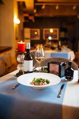 Restaurant table with tagliatelle wild mushrooms