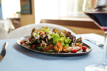Chicken salad with greens and white sauce
