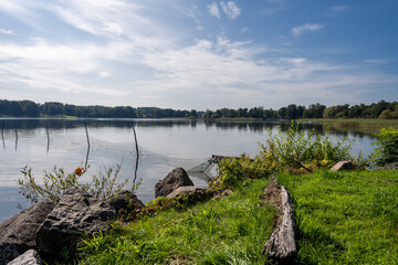 A fishing net in a beautiful lake. Blue sky and water in the background. Picture from Ringsjon in the Malmo area in southern Sweden