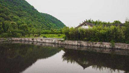 Fototapeta na wymiar Pond and landscape in Lanting (Orchid Pavilion) scenic area, Shaoxing, China