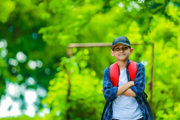 Indian cute schoolboy with backpack, Back to school concept