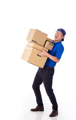 young Asian delivery man in blue uniform, carry cardboard box in hands isolated on white background.