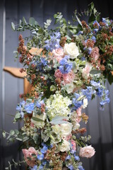 Ornate Flower Arrangement on a Wedding Altar with White and Pink Roses, Hydrangea and Purple Blue Flowers Wedding Photography