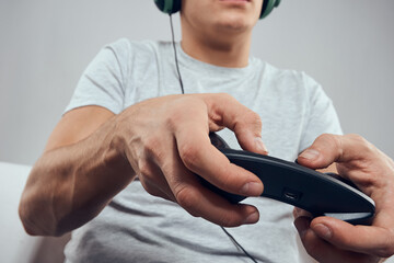 Gamepad male hands close-up video game addiction office technology