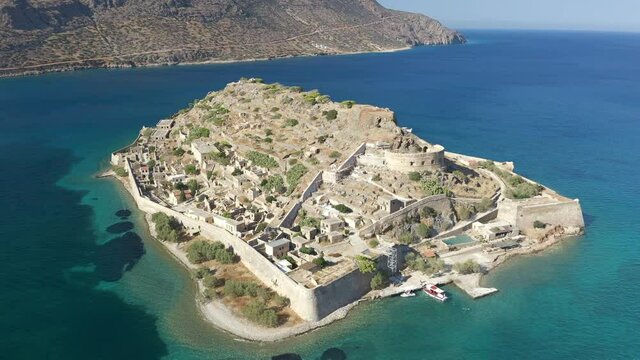 Aerial drone view of the ancient Venetian fortress and former leper colony on Spinalonga on the Greek island of Crete