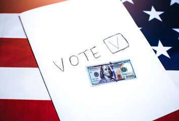 American flag with dollars on it. Elections in the USA. Bought votes. Money as concept of corruption. Unfair political changes in the country.